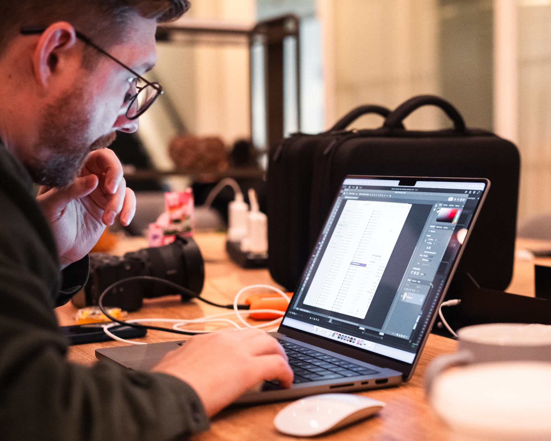Person reviewing a business document on a laptop